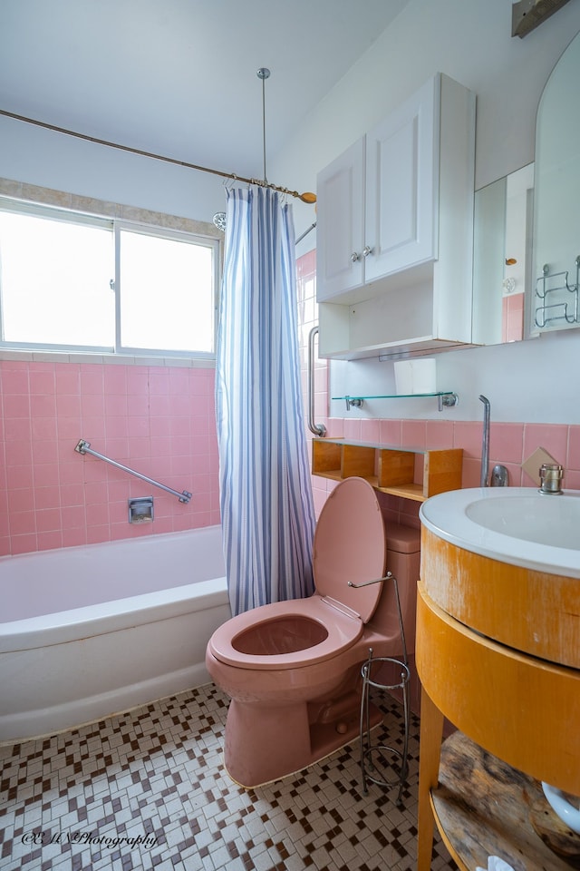 full bath featuring shower / bath combination with curtain, vanity, and toilet