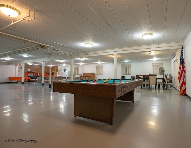 rec room with concrete floors and pool table