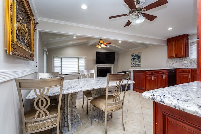 dining area featuring light tile patterned floors, a ceiling fan, vaulted ceiling with beams, a fireplace, and recessed lighting