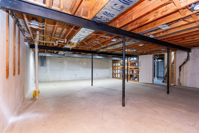 unfinished basement with electric panel