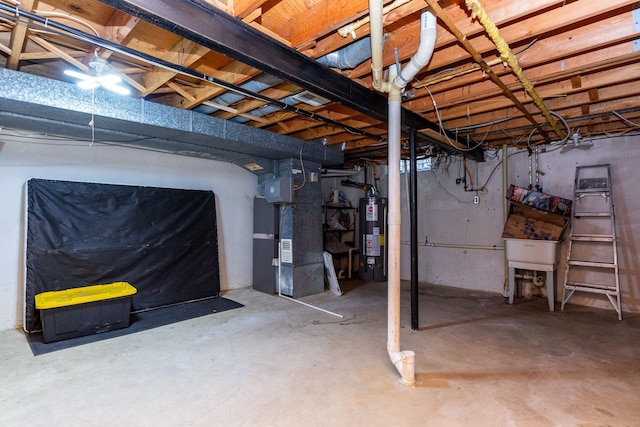 unfinished basement featuring water heater and heating unit