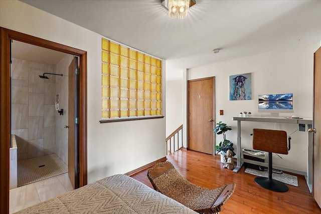 bedroom with wood finished floors