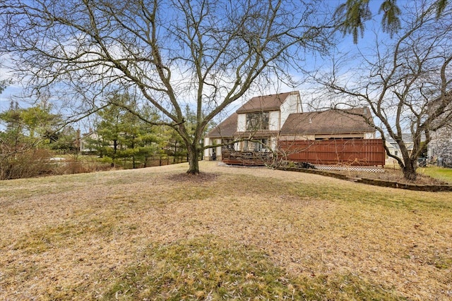 view of yard featuring a wooden deck