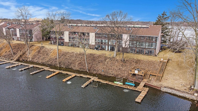 view of property with a water view