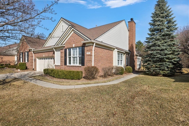 view of home's exterior featuring driveway, a yard, an attached garage, brick siding, and a chimney