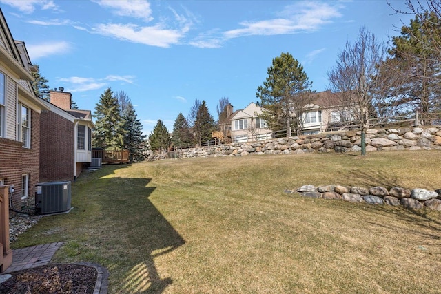 view of yard with central AC