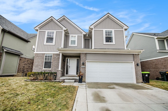 view of front facade with a garage, brick siding, driveway, a front lawn, and board and batten siding