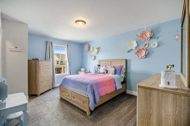 bedroom featuring carpet floors and baseboards