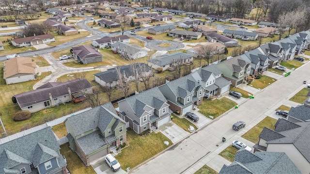 birds eye view of property with a residential view