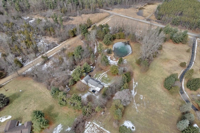 birds eye view of property featuring a rural view