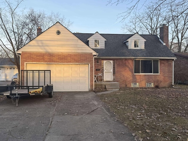 view of front of property featuring a garage, driveway, brick siding, and a chimney