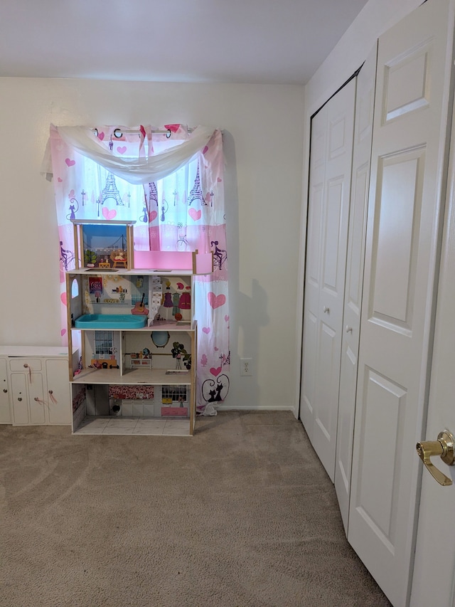 game room with carpet flooring