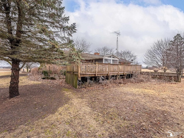 view of yard with a wooden deck