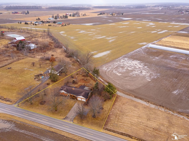 birds eye view of property featuring a rural view