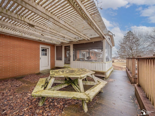 wooden deck featuring a pergola