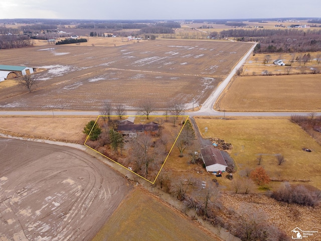 birds eye view of property featuring a rural view