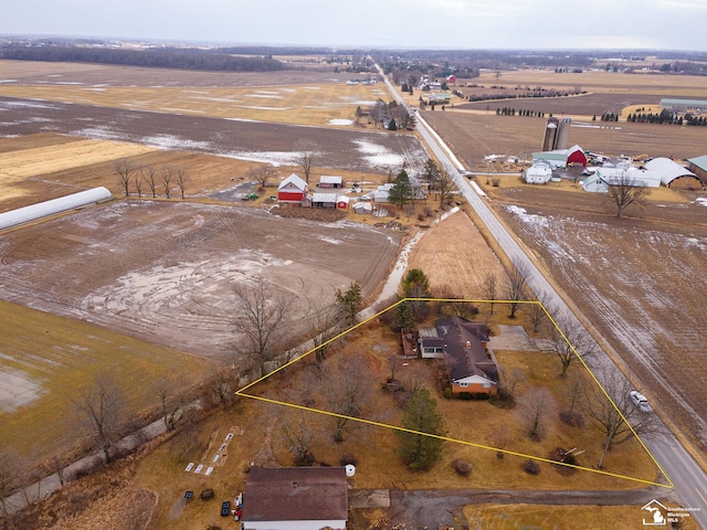 birds eye view of property featuring a rural view