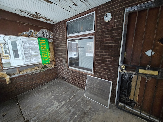 exterior space with brick siding