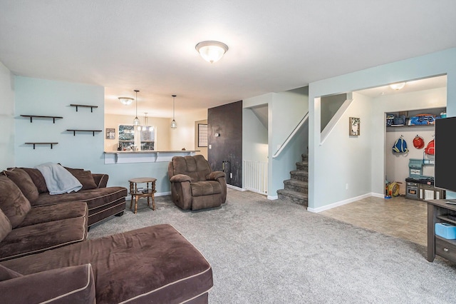 living room with stairway, carpet, and baseboards