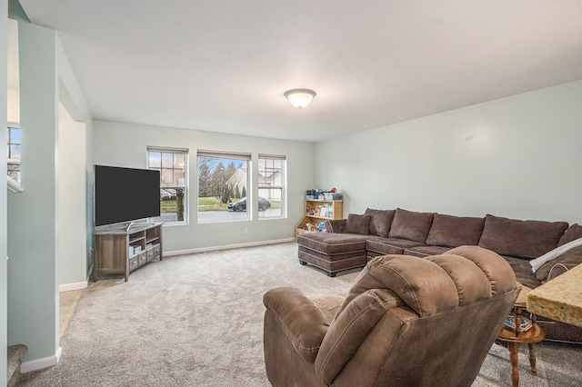 living room with carpet floors and baseboards