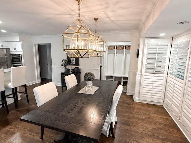 dining area featuring recessed lighting, ornamental molding, and dark wood finished floors