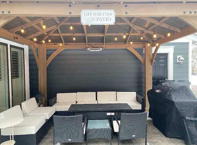 view of patio featuring outdoor lounge area, a gazebo, and a grill