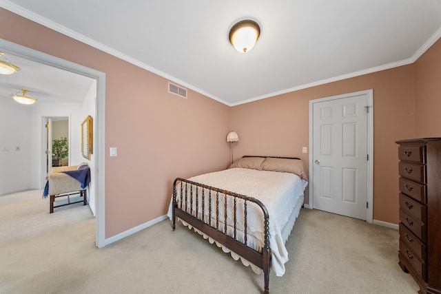 bedroom featuring visible vents, crown molding, light carpet, and baseboards