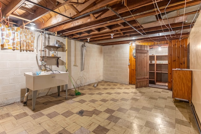 unfinished basement with tile patterned floors