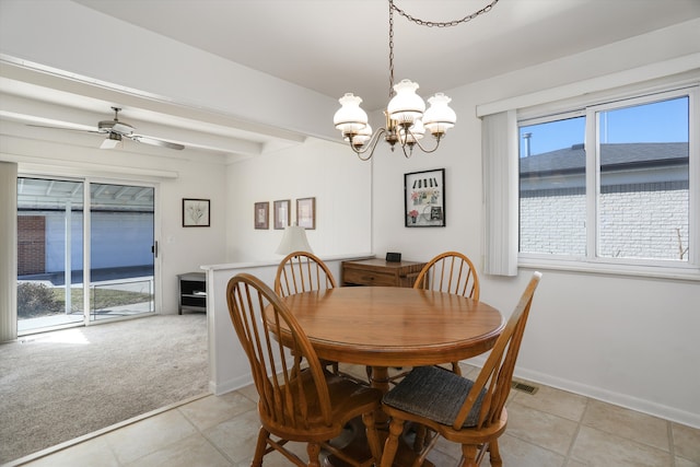 dining space featuring light tile patterned floors, baseboards, light carpet, beamed ceiling, and ceiling fan with notable chandelier