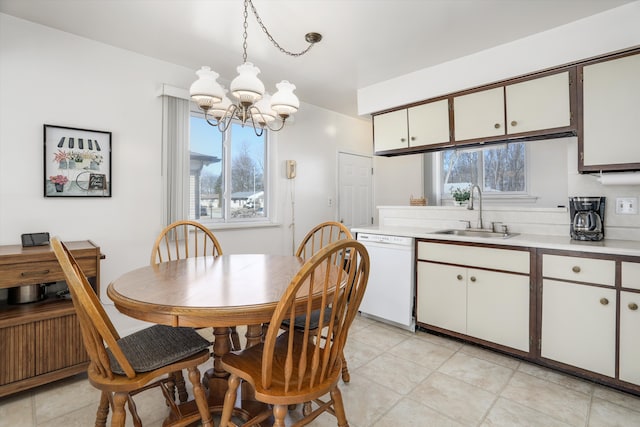 dining area featuring a chandelier