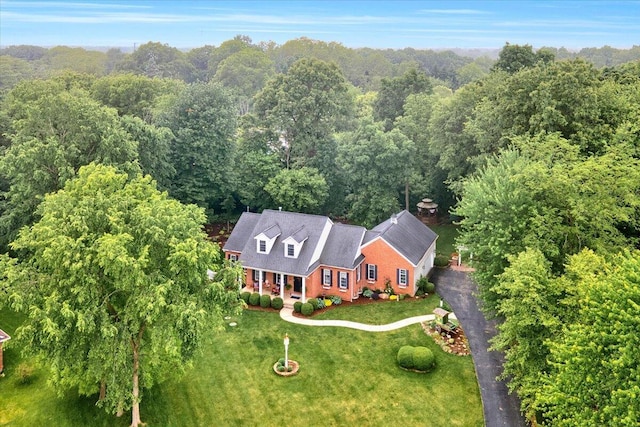 aerial view featuring a forest view