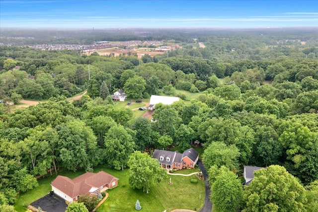 aerial view featuring a view of trees