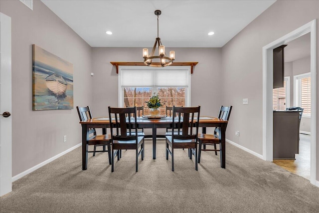 dining area with recessed lighting, carpet flooring, a notable chandelier, and baseboards