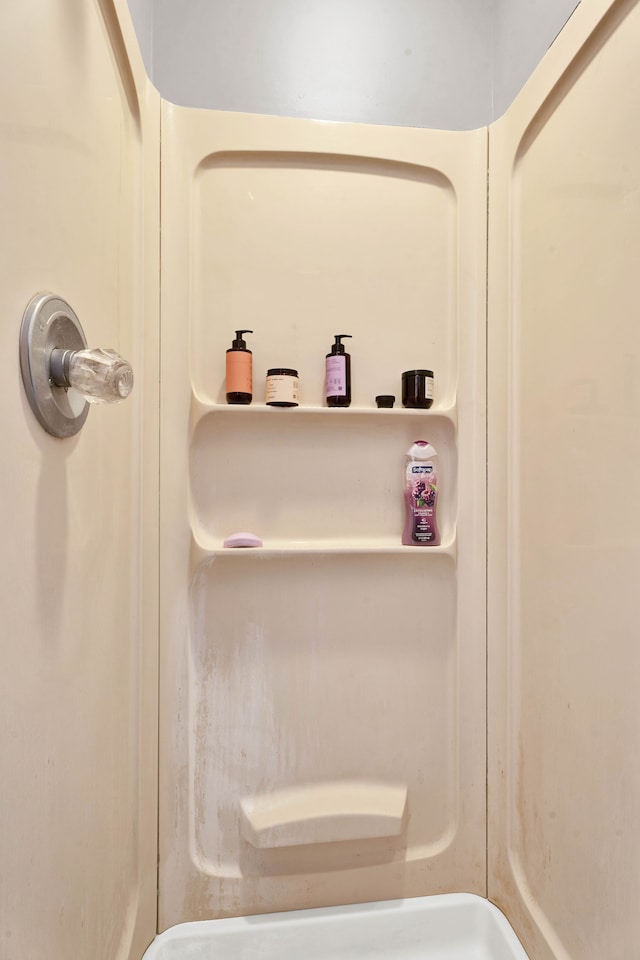 full bathroom featuring walk in shower