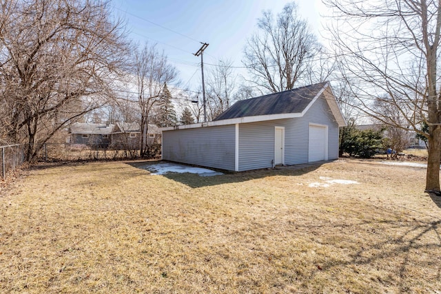 detached garage with fence