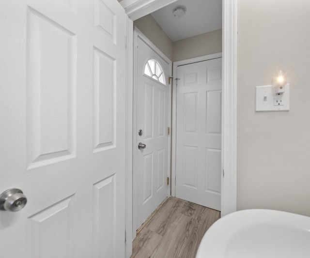 bathroom featuring wood finished floors