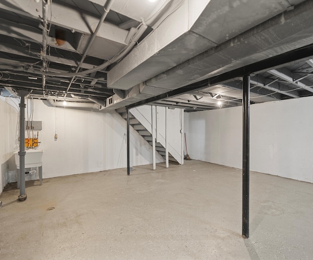 unfinished basement with stairs