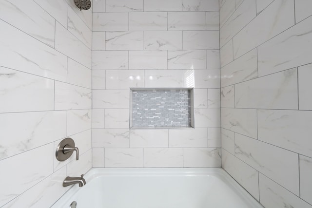 bathroom with shower / bath combination