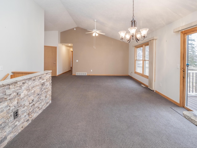 unfurnished living room with carpet floors, visible vents, vaulted ceiling, baseboards, and ceiling fan with notable chandelier