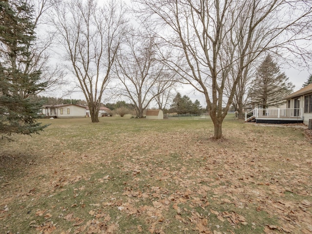 view of yard featuring a deck