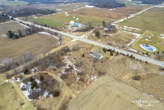 birds eye view of property featuring a rural view