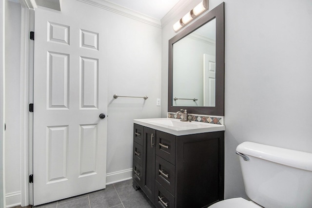 half bath with tile patterned flooring, crown molding, vanity, and toilet