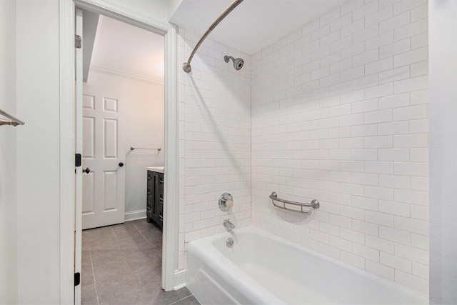 full bath with tile patterned flooring, bathing tub / shower combination, and vanity