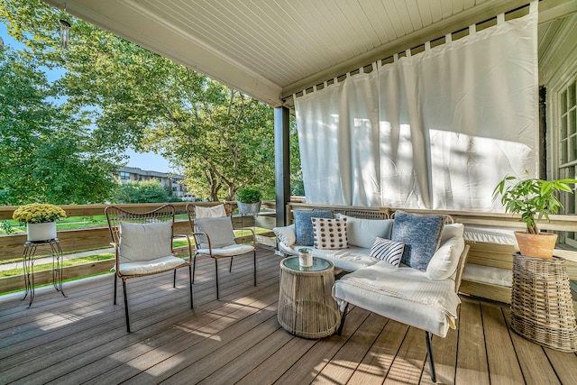 wooden deck with outdoor lounge area