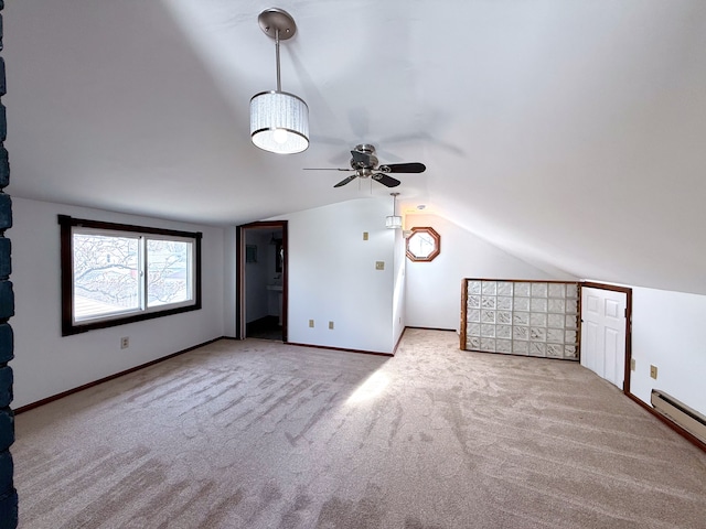 bonus room with carpet, lofted ceiling, baseboards, and baseboard heating