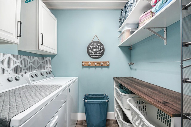 laundry room featuring cabinet space, independent washer and dryer, and baseboards