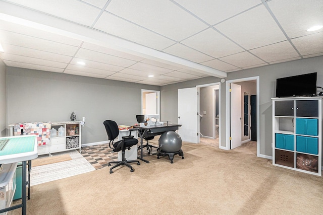 carpeted office with a paneled ceiling, baseboards, and recessed lighting