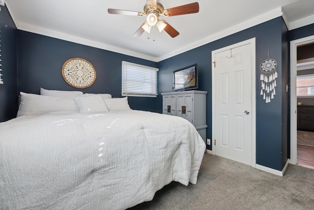 carpeted bedroom with baseboards, multiple windows, and ceiling fan