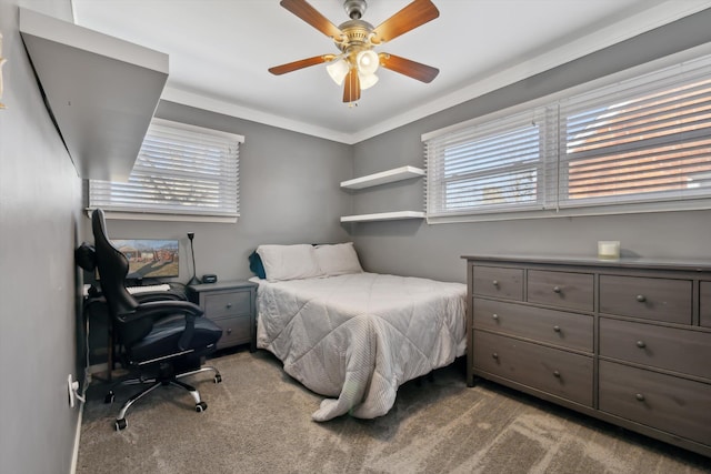 bedroom with carpet, ceiling fan, and crown molding