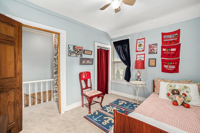 bedroom with a ceiling fan, baseboards, a closet, and light colored carpet